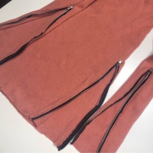 Dusty pink ribbed knit sweater dress with cool zipper details